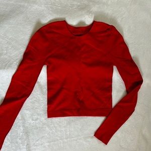Red athletic top. Size Small from Fabletics.